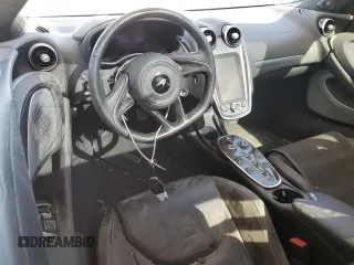 2023 McLaren GT z VIN SBM22GCA0PW002765, wystawiony jako Copart lot #78866364 z przebiegiem Nie podano mil oraz Szkody całkowita. Historia ofert i sprzedaży dostępna na DreamBid. Obrazek 8.