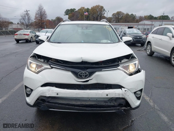 2017 Toyota RAV4 XLE with VIN JTMRFREV6HJ716907, listed as a IAAI auction lot 41056444 with 118,335 mi miles. Bid and sale history available at carsss.com. Image 6.