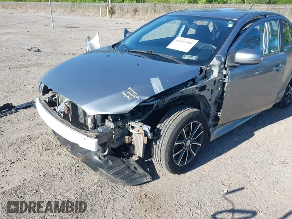 2015 Mitsubishi Lancer SE with VIN JA32V2FWXFU023626, listed as a IAAI auction lot 42012381 with 143,981 mi miles. Bid and sale history available at carsss.com. Image 6.