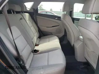 2016 Hyundai Tucson SE z VIN KM8J3CA41GU222107, wystawiony jako Copart lot #55587125 z przebiegiem 99 918 mil mil oraz Szkoda całkowita • Salvage title. Historia ofert i sprzedaży dostępna na DreamBid. Obrazek 11.