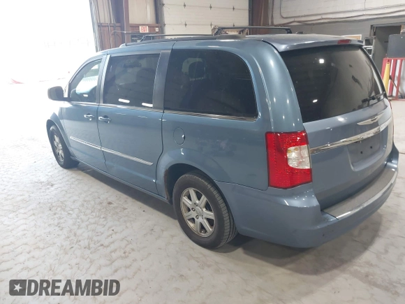 2011 Chrysler Town & Country Touring with VIN 2A4RR5DG4BR779844, listed as a IAAI auction lot 42167693 with 272,502 mi miles and . Bid and sale history available at DreamBid. Image 3.