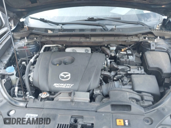 2016 Mazda CX-5 Grand Touring with VIN JM3KE2DY1G0708572, listed as a IAAI auction lot 41685298 with 109,427 mi miles. Bid and sale history available at carsss.com. Image 10.