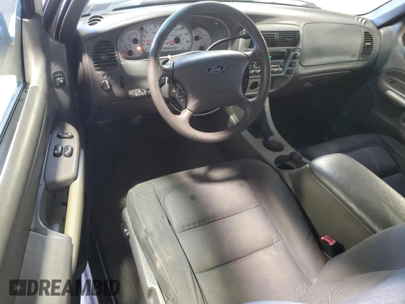 2002 Ford Explorer Sport Value z VIN 1FMYU70EX2UB69736, wystawiony jako Copart lot #76315924 z przebiegiem 109 492 mil mil oraz Szkody całkowita. Historia ofert i sprzedaży dostępna na DreamBid. Obrazek 8.