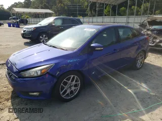 2015 Ford Focus SE with VIN 1FADP3F2XFL299193, listed as a Copart auction lot 59744715 with 141,317 mi miles and Salvage title. Bid and sale history available at DreamBid. Image 1.