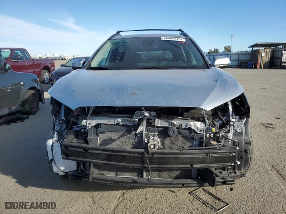 2022 Toyota Corolla Cross LE with VIN 7MUCAABG9NV042753, listed as a Copart auction lot 88469125 with 23,760 mi miles and Salvage Title. Bid and sale history available at carsss.com. Image 5.
