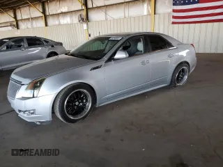 2011 Cadillac CTS Premium with VIN 1G6DP5ED5B0104639, listed as a Copart auction lot 54268885 with 173,947 mi miles and Salvage title. Bid and sale history available at DreamBid. Image 1.