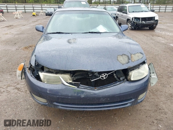 1999 Toyota Solara SE with VIN 2T1CF22P9XC113933, listed as a IAAI auction lot 41975806 with 239,883 mi miles. Bid and sale history available at carsss.com. Image 6.