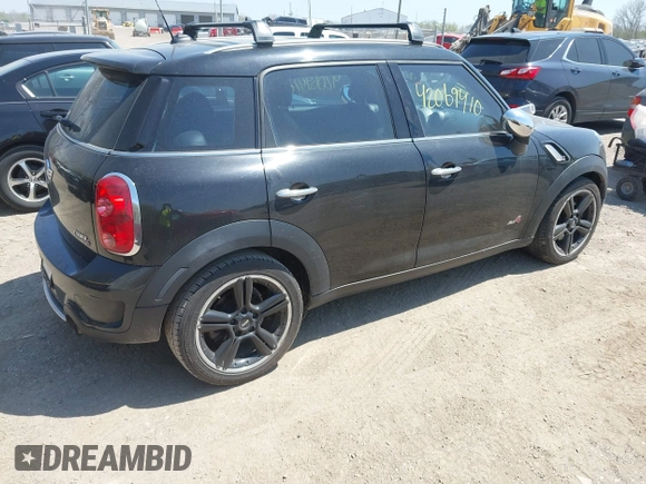 2011 MINI Countryman S with VIN WMWZC5C50BWL53922, listed as a IAAI auction lot 42069410 with 66,797 mi miles and . Bid and sale history available at DreamBid. Image 4.