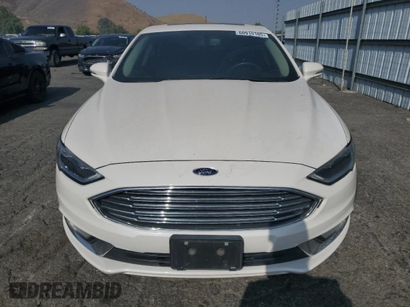 2017 Ford Fusion SE с VIN 3FA6P0HD3HR157987, выставлен на аукционе Copart как лот 60915105 с пробегом 149 347 миль миль и Списание • Salvage title. История ставок и продаж доступна на DreamBid. Изображение 5.