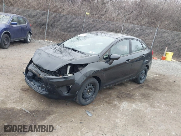 2012 Ford Fiesta S with VIN 3FADP4AJ8CM145208, listed as a IAAI auction lot 41784292 with 99,167 mi miles. Bid and sale history available at carsss.com. Image 2.