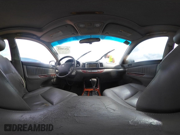 2005 Toyota Camry LE with VIN 4T1BF32K15U091945, listed as a IAAI auction lot 42124503 with 212,951 mi miles and . Bid and sale history available at DreamBid. Image 20.