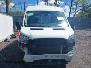 2020 Ford Transit Cargo z VIN 1FTBR1C8XLKA04894, wystawiony jako IAAI lot #42176726 z przebiegiem 84 154 mil mil oraz . Historia ofert i sprzedaży dostępna na DreamBid. Obrazek 12.