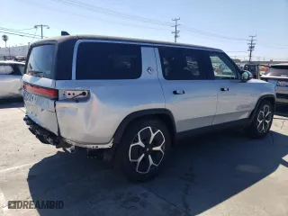 2024 Rivian R1S Adventure with VIN 7PDSGABA7RN036602, listed as a Copart auction lot 67867944 with 1,006 mi miles and Salvage Title. Bid and sale history available at carsss.com. Image 3.