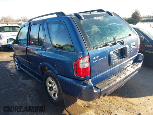 2004 Isuzu Rodeo S with VIN 4S2CK58W444314265, listed as a IAAI auction lot 41294636 with 291,080 mi miles and . Bid and sale history available at DreamBid. Image 3.