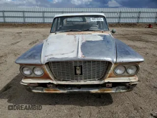 1960 Plymouth Valiant z VIN 1307117456, wystawiony jako Copart lot #48976045 z przebiegiem 20 241 mil mil oraz Czysty tytuł • Clean title. Historia ofert i sprzedaży dostępna na DreamBid. Obrazek 5.