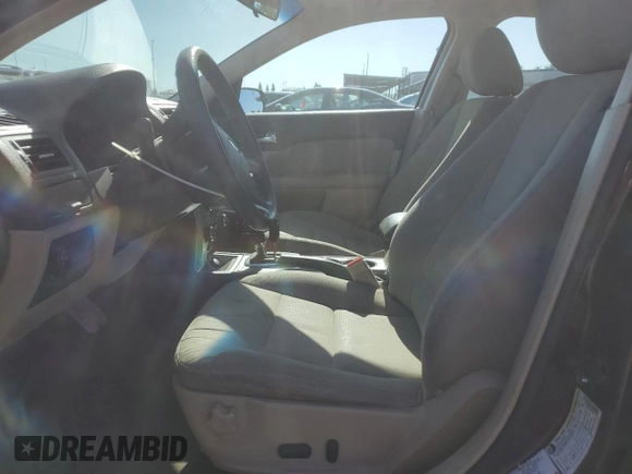 2012 Ford Fusion SE with VIN 3FAHP0HG5CR441813, listed as a Copart auction lot 57835195 with 143,916 mi miles and Salvage title. Bid and sale history available at DreamBid. Image 7.