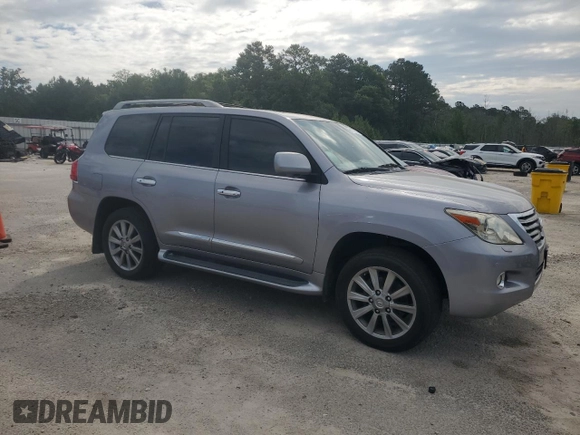 2011 Lexus LX 570 with VIN JTJHY7AX6B4061104, listed as a Copart auction lot 57788225 with 184,040 mi miles and Clean title. Bid and sale history available at DreamBid. Image 4.