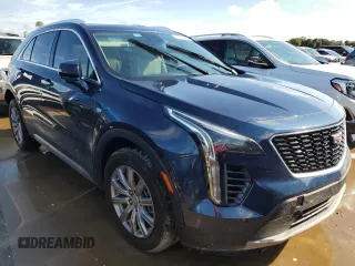 2021 Cadillac XT4 FWD Premium Luxury z VIN 1GYFZCR48MF056210, wystawiony jako Copart lot #73706384 z przebiegiem Nie podano mil oraz Nie do naprawy • Non repairable. Historia ofert i sprzedaży dostępna na DreamBid. Obrazek 4.