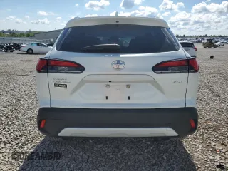 2023 Toyota Corolla Cross XLE with VIN 7MUDAAAG5PV068355, listed as a Copart auction lot 58121795 with 25,667 mi miles and Salvage title. Bid and sale history available at DreamBid. Image 6.
