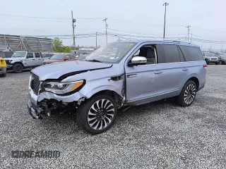 2022 Lincoln Navigator Black Label z VIN 5LMJJ2TT1NEL12091, wystawiony jako Copart lot #57460695 z przebiegiem 44 069 mil mil oraz Szkoda całkowita • Salvage title. Historia ofert i sprzedaży dostępna na DreamBid. Obrazek 1.