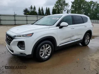 2019 Hyundai Santa Fe SEL z VIN 5NMS33AD7KH044003, wystawiony jako Copart lot #58701775 z przebiegiem 131 078 mil mil oraz Czysty tytuł • Clean title. Historia ofert i sprzedaży dostępna na DreamBid. Obrazek 1.