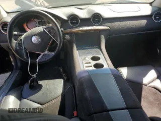 2012 Fisker Karma EcoSport z VIN YH4K14AA3CA001913, wystawiony jako Copart lot #67970964 z przebiegiem Nie podano mil oraz Nie do naprawy. Historia ofert i sprzedaży dostępna na DreamBid. Obrazek 8.