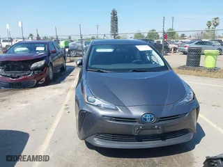 2022 Toyota Prius L Eco with VIN JTDKAMFU5N3160694, listed as a IAAI auction lot 41874909 with 80,376 mi miles. Bid and sale history available at carsss.com. Image 12.