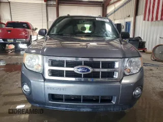 2012 Ford Escape XLT z VIN 1FMCU9DG8CKA93402, wystawiony jako Copart lot #62266845 z przebiegiem 196 779 mil mil oraz Szkoda całkowita • Salvage title. Historia ofert i sprzedaży dostępna na DreamBid. Obrazek 5.