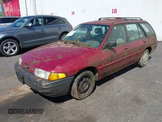 1994 Ford Escort with VIN 3FARP15J1RR159381, listed as a IAAI auction lot 41953498 with 68,860 mi miles and . Bid and sale history available at DreamBid. Image 2.