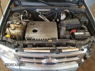2009 Ford Escape Hybrid with VIN 1FMCU49399KA29841, listed as a Copart auction lot 64803435 with 131,289 mi miles and Salvage title. Bid and sale history available at DreamBid. Image 11.