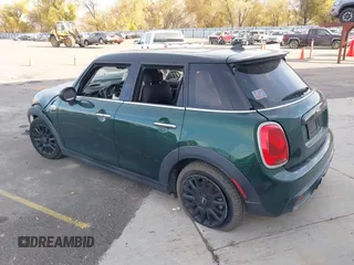 2016 MINI Cooper Hardtop 4 Door S with VIN WMWXU3C58G2D28227, listed as a IAAI auction lot 38046281 with 56,694 mi miles. Bid and sale history available at carsss.com. Image 3.