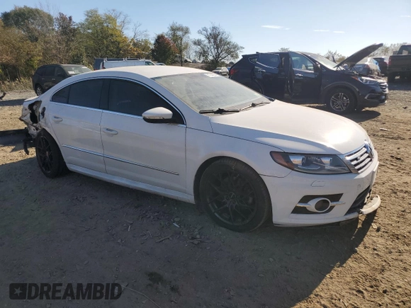 2014 Volkswagen CC R-Line with VIN WVWBP7AN2EE503420, listed as a Copart auction lot 77744894 with 99,679 mi miles and Salvage Title. Bid and sale history available at carsss.com. Image 4.