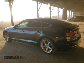 2018 Audi A5 Sportback Premium with VIN WAUDNCF52JA004082, listed as a Copart auction lot 87002474 with 84,790 mi miles and Salvage Title. Bid and sale history available at carsss.com. Image 2.