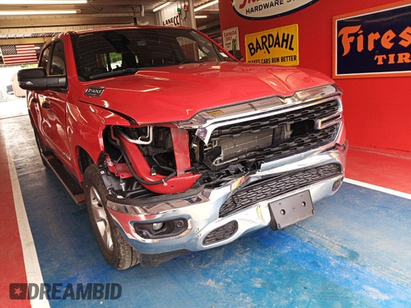 2023 Ram 1500 Big Horn z VIN 1C6RRFFG9PN561001, wystawiony jako IAAI lot #42575762 z przebiegiem 42 164 mil mil oraz . Historia ofert i sprzedaży dostępna na DreamBid. Obrazek 13.