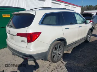 2016 Honda Pilot Elite with VIN 5FNYF6H05GB019292, listed as a IAAI auction lot 41668830 with 170,718 mi miles. Bid and sale history available at carsss.com. Image 4.