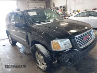 2007 GMC Envoy SLE with VIN 1GKDT13S472123167, listed as a IAAI auction lot 41385620 with 157,680 mi miles. Bid and sale history available at carsss.com. Image 1.