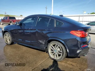 2018 BMW X4 M40i with VIN 5UXXW7C54J0Z44932, listed as a Copart auction lot 55973605 with 101,479 mi miles and Salvage title. Bid and sale history available at DreamBid. Image 2.