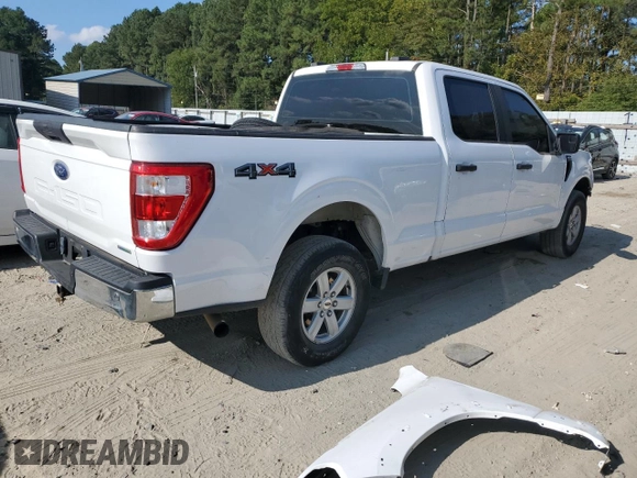 2021 Ford F-150 XL with VIN 1FTFW1E82MKD23506, listed as a Copart auction lot 71162334 with 71,387 mi miles and Salvage Title. Bid and sale history available at carsss.com. Image 3.