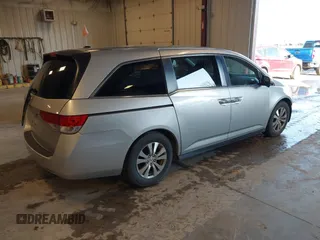 2015 Honda Odyssey EX-L with VIN 5FNRL5H6XFB063430, listed as a IAAI auction lot 41913142 with 238,051 mi miles and . Bid and sale history available at carsss.com. Image 4.