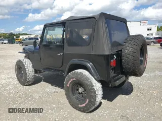 1991 Jeep Wrangler with VIN 2J4FY29S1MJ156667, listed as a Copart auction lot 75870604 with 144,399 mi miles and Clean Title. Bid and sale history available at carsss.com. Image 2.