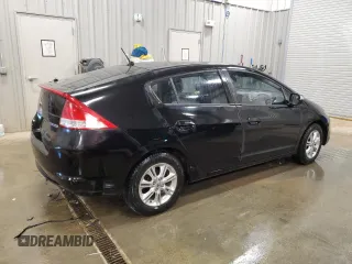 2010 Honda Insight EX z VIN JHMZE2H72AS009647, wystawiony jako Copart lot #60079205 z przebiegiem 157 844 mil mil oraz Czysty tytuł • Clean title. Historia ofert i sprzedaży dostępna na DreamBid. Obrazek 3.