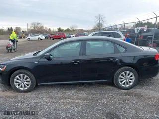 2014 Volkswagen Passat Wolfsburg Ed with VIN 1VWAT7A31EC098634, listed as a IAAI auction lot 41924146 with 80,872 mi miles. Bid and sale history available at carsss.com. Image 14.