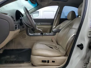 2005 Lincoln LS Sport z VIN 1LNHM87A95Y653578, wystawiony jako Copart lot #76339924 z przebiegiem 97 998 mil mil oraz Szkoda całkowita • Salvage title. Historia ofert i sprzedaży dostępna na DreamBid. Obrazek 7.