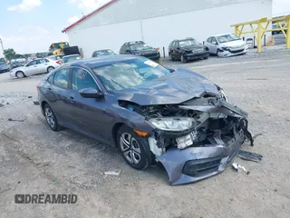 2017 Honda Civic LX with VIN 19XFC2F5XHE207658, listed as a IAAI auction lot 42594799 with 103,068 mi miles and . Bid and sale history available at DreamBid. Image 1.