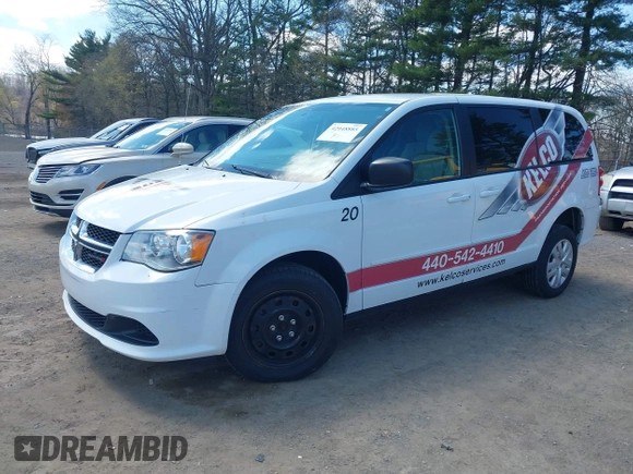 2017 Dodge Grand Caravan SE with VIN 2C7WDGBG3HR828825, listed as a IAAI auction lot 42048885 with 231,690 mi miles and . Bid and sale history available at DreamBid. Image 2.