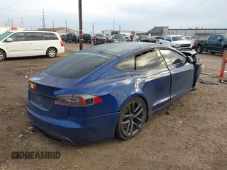 2021 Tesla Model S Long Range with VIN 5YJSA1E50MF432224, listed as a IAAI auction lot 41417130 with Not provided miles and . Bid and sale history available at DreamBid. Image 4.