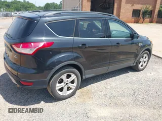 2014 Ford Escape SE z VIN 1FMCU9GX4EUC33710, wystawiony jako IAAI lot #42549888 z przebiegiem 117 057 mil mil oraz . Historia ofert i sprzedaży dostępna na DreamBid. Obrazek 4.