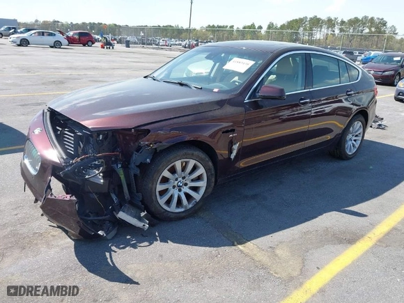 2011 BMW 5 Series Gran Turismo 550i xDrive with VIN WBASP4C53BC341636, listed as a IAAI auction lot 41883438 with 203,526 mi miles. Bid and sale history available at carsss.com. Image 2.