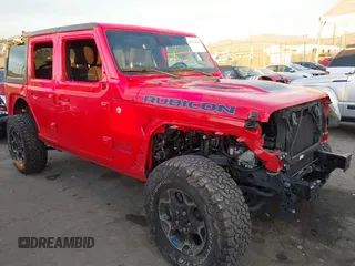 2022 Jeep Wrangler Unlimited Rubicon with VIN 1C4JJXR63NW206709, listed as a IAAI auction lot 41254820 with 25,317 mi miles and . Bid and sale history available at DreamBid. Image 1.