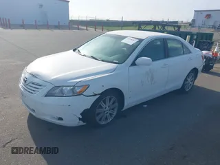 2007 Toyota Camry CE with VIN 4T1BE46KX7U517265, listed as a IAAI auction lot 42098343 with 131,541 mi miles. Bid and sale history available at carsss.com. Image 2.